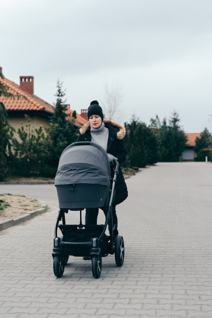 woman pushing stroller